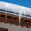 How Can Attic Insulation Help Prevent Ice Dams on the Roof?