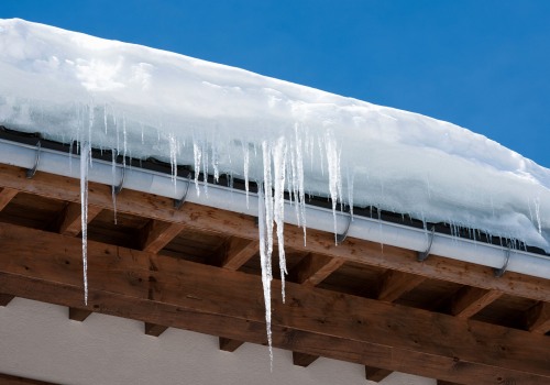 How Can Attic Insulation Help Prevent Ice Dams on the Roof?